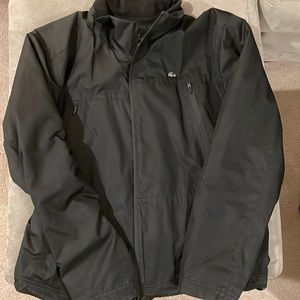 Lacoste black coat. Fleece inside, waterproof. Men’s large, 54/6 European. $60